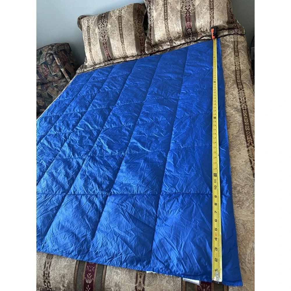 The BIG One Travel Puffer Throw in Travel Bag 60